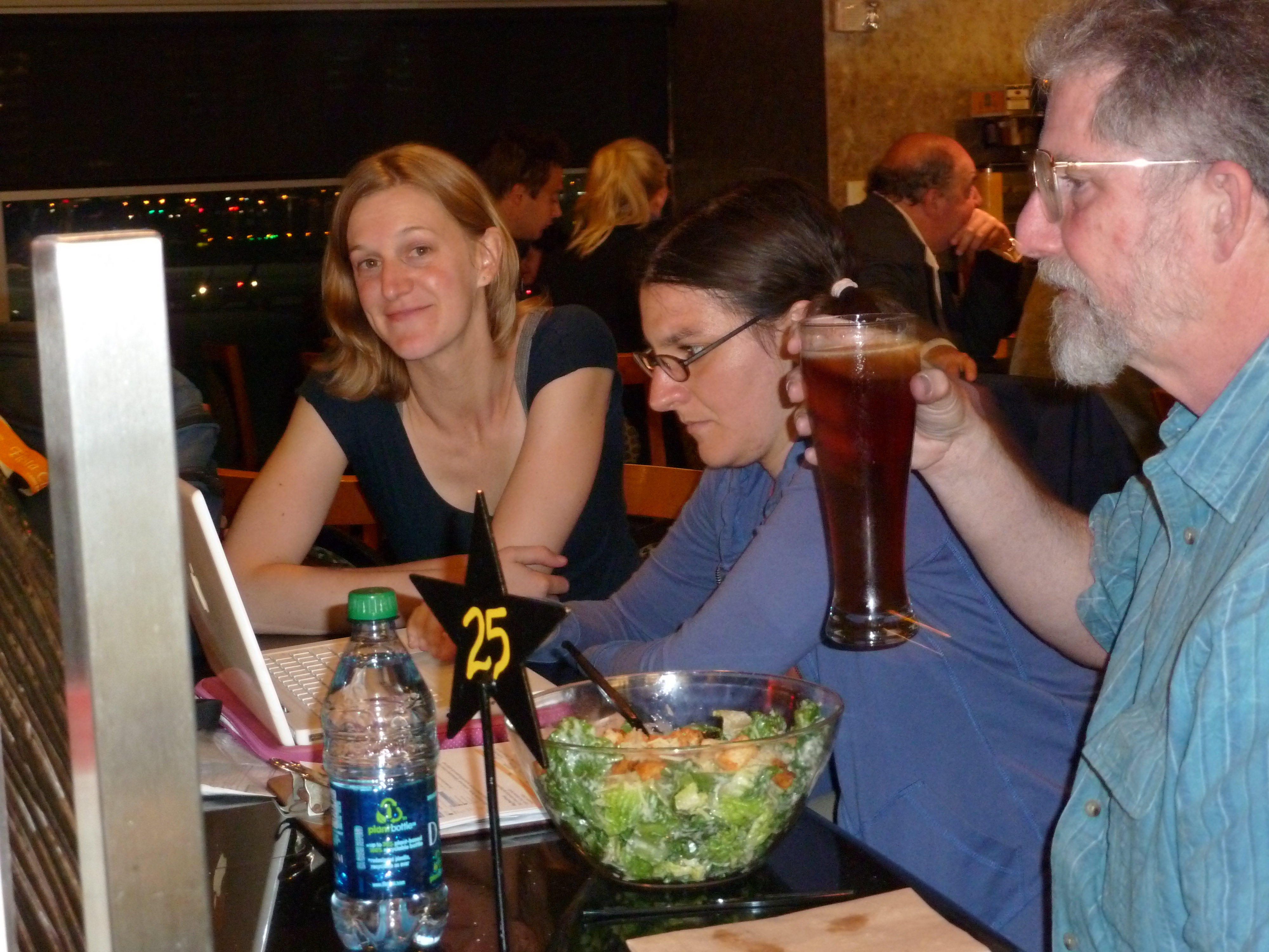 Team Arachnology: Charles is chilling with a beer (and his last raw vegetables...), while Natalia is figuring out how to blog...