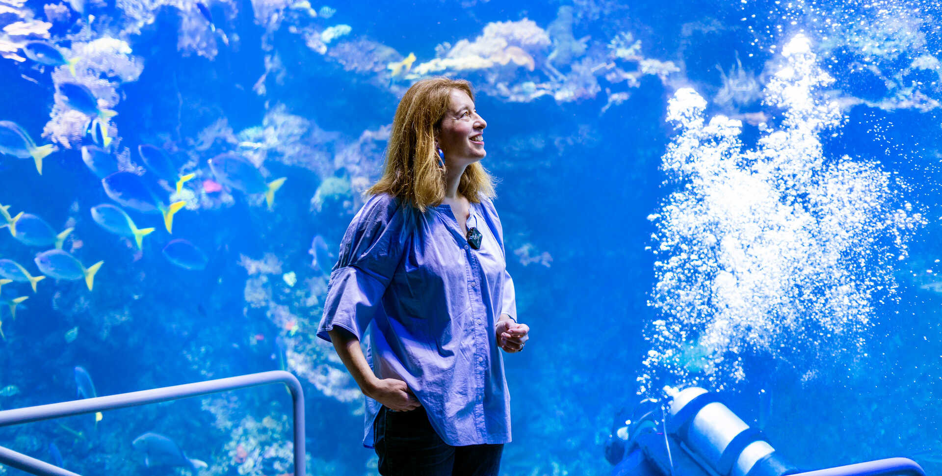 De Young curator Emma Acker view the Philippine Coral Reef exhibit at the Cal Academy. Photo by Nicole Ravicchio