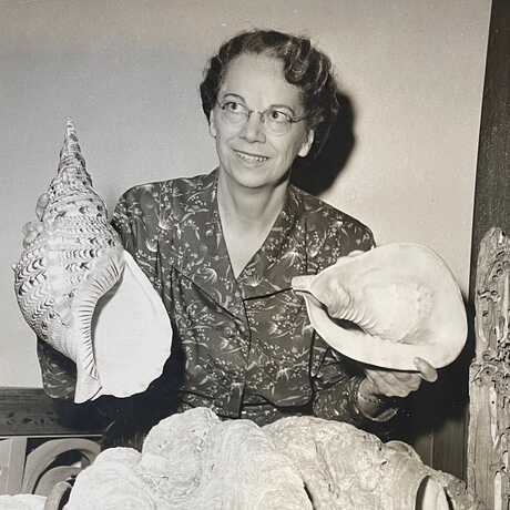 A. Myra Keen holding two shells